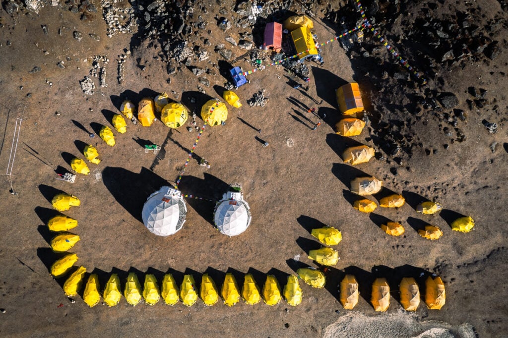 an aerial view of a bunch of yellow objects
